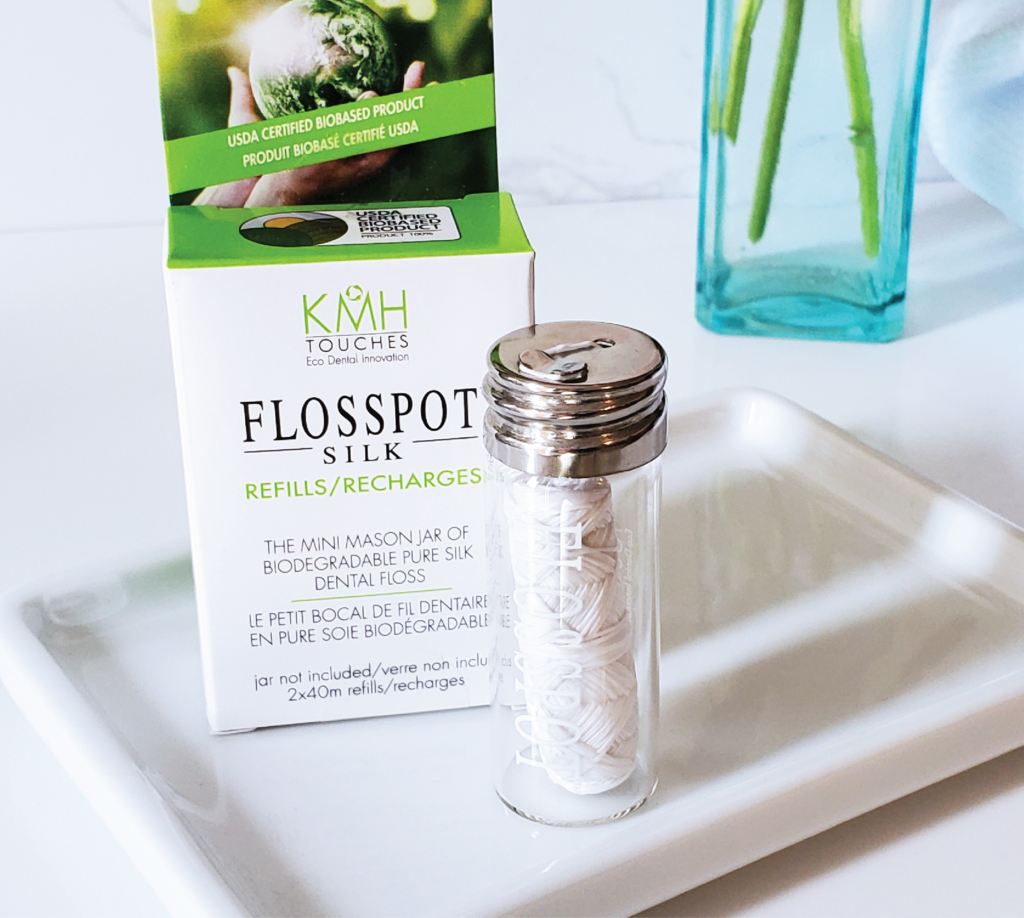 Flosspot Silk glass jar with package of Flosspot Silk refill behind