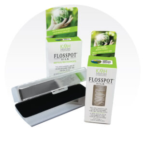 Group of Flosspot Silk products listed as Flosspot Silk Elegance: Package with glass dispenser, package of refills, and a silver travel case